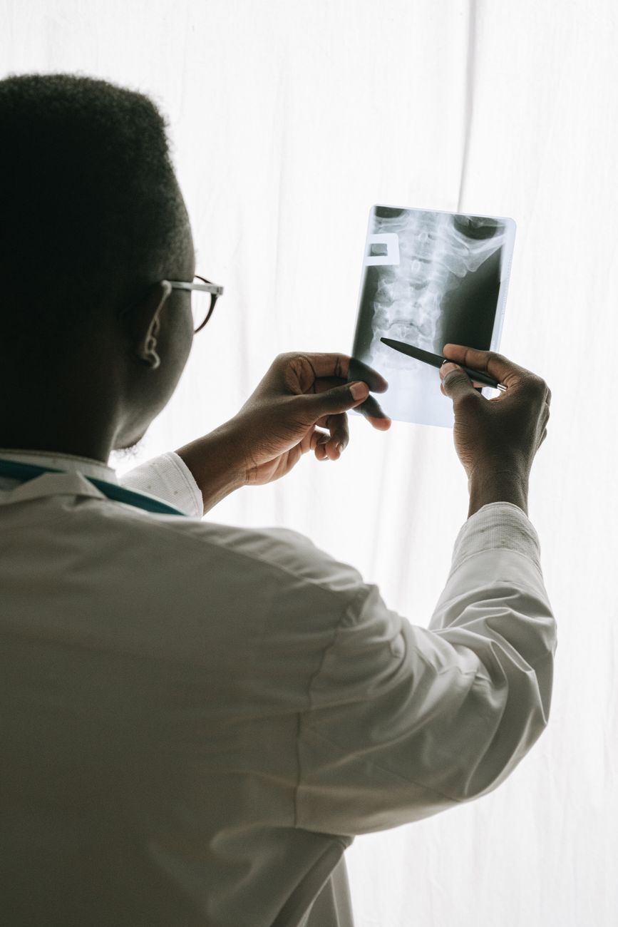 a doctor looking at an x ray